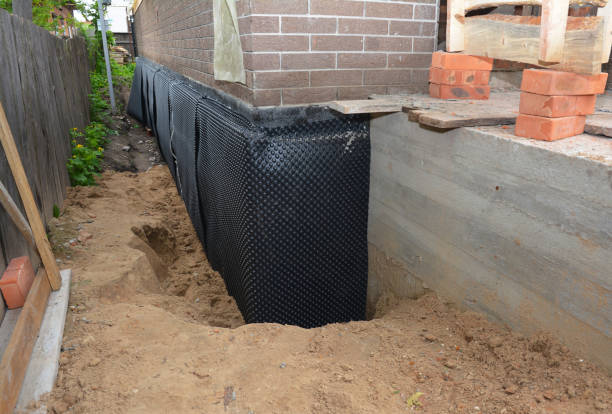 Happy homeowners after waterproofing job in Mount Carmel